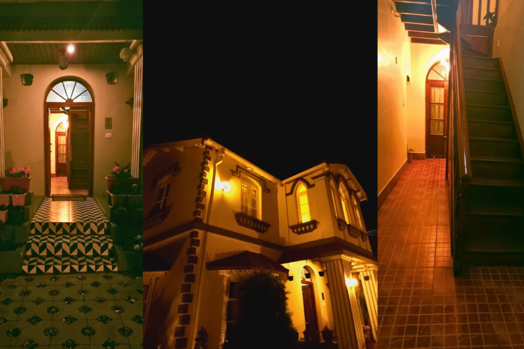 The night view of the entry way, exterior, and stairway of Humming Bird, a budget stay in Ooty.