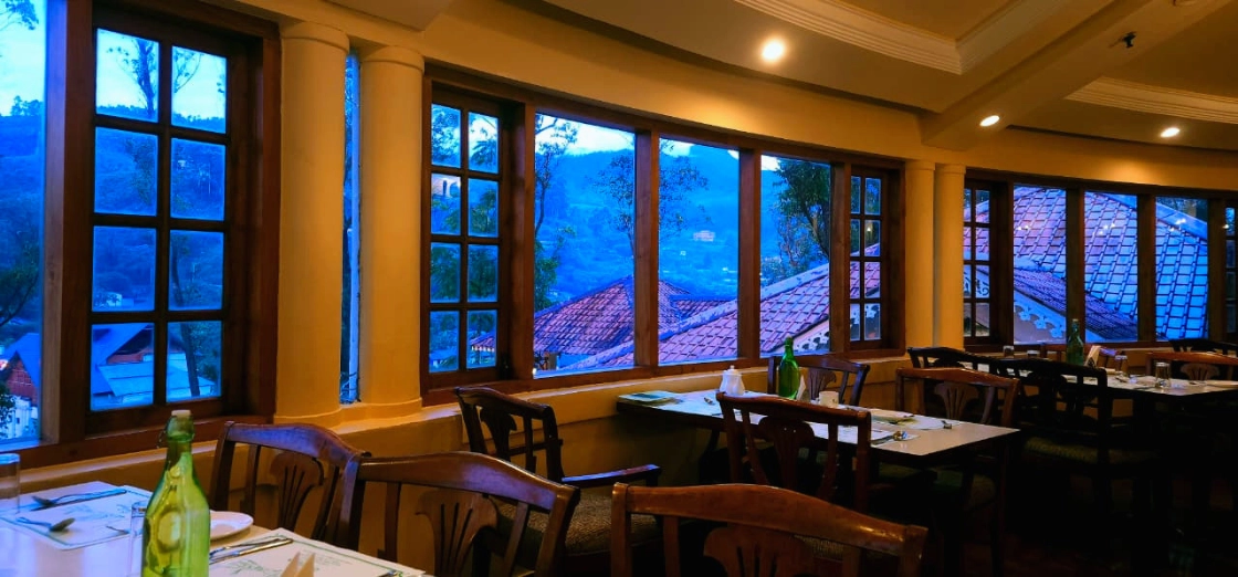 Tea County Munnar Dining Area Image at Evening